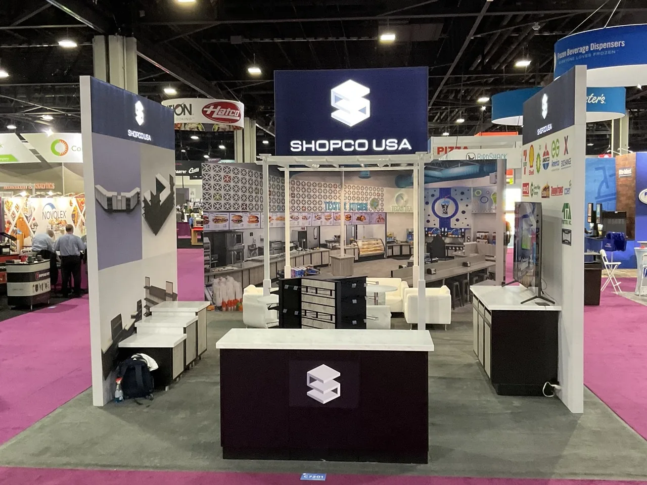 Shopco USA exhibit on the show floor.
